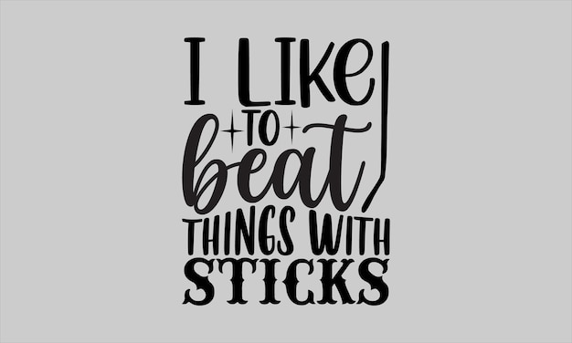 A gray t - shirt with the title'i like to beat things with sticks '