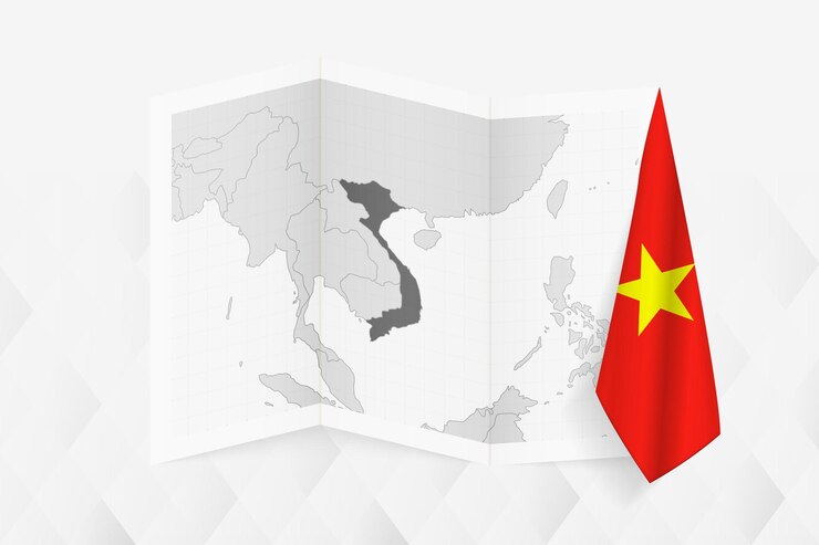 Vector a grayscale map of vietnam with a hanging vietnamese flag on one side