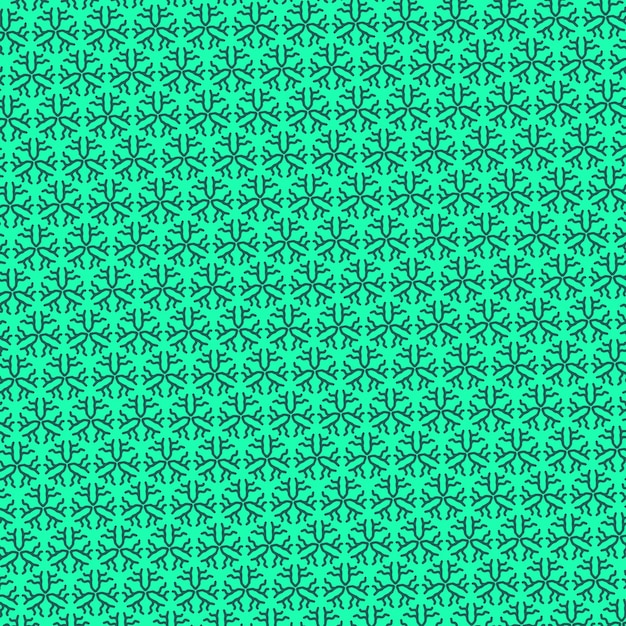 緑の背景に星と線のパターン。