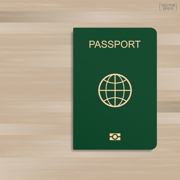 木製のパターンとテクスチャの背景に緑色のパスポート。