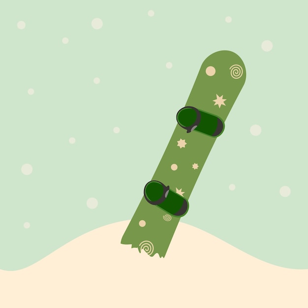 雪の中に立っている緑のスノーボード