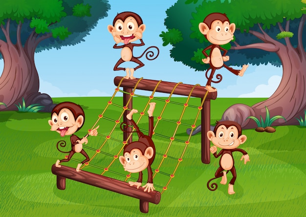 Vettore un branco di scimmie che giocano al parco giochi
