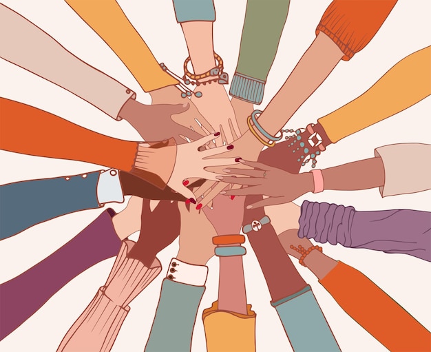 Group of arms and hands on top of each other in a circle of diverse multiethnic peoplePeople