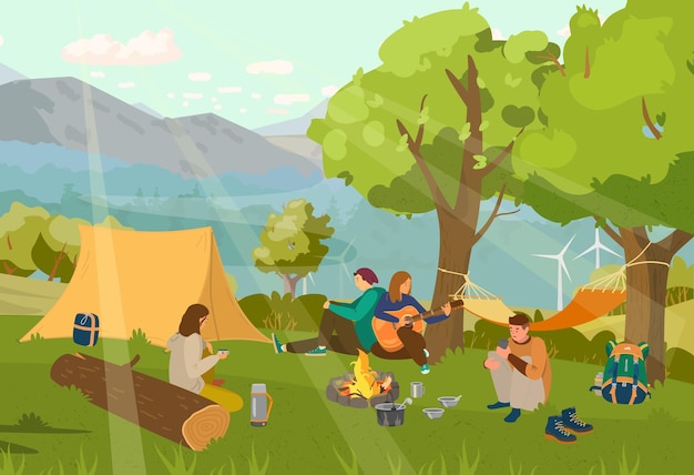 group of friends in camp site sitting around campfire playing guitar.