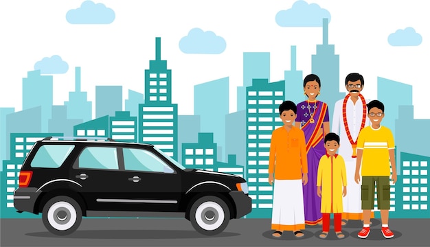 Группа индийской женщины, мужчины и детей в традиционной национальной одежде, стоящих вместе возле машины