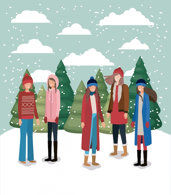 Vettore gruppo di donne in snowscape con abiti invernali