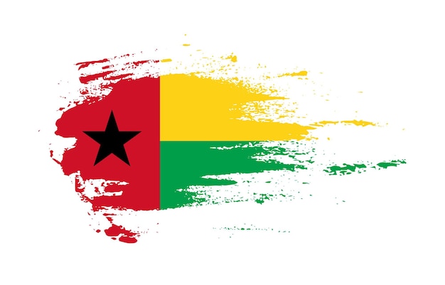 Grunge brush stroke flag of Guinea-Bissau with painted brush splatter effect on solid background