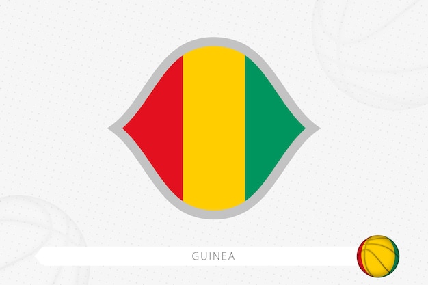 Guinea flag for basketball competition on gray basketball background.