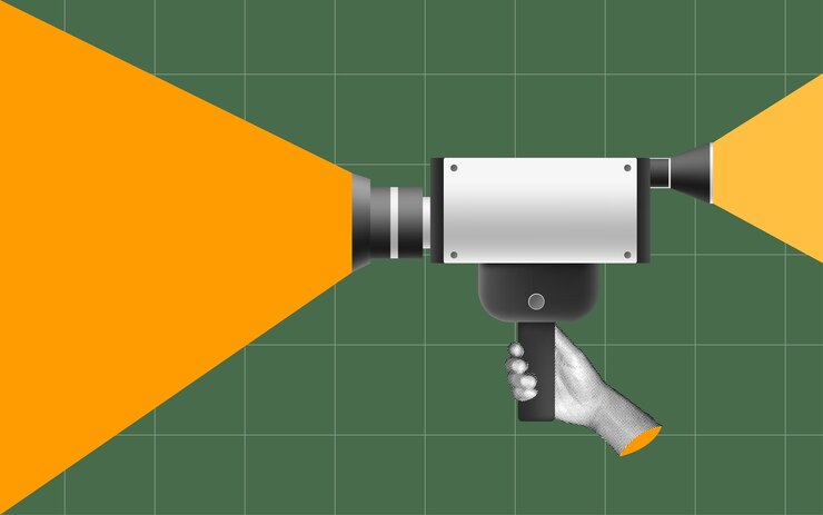 Vector halftone collage hand holding a retro camera on a green grid background