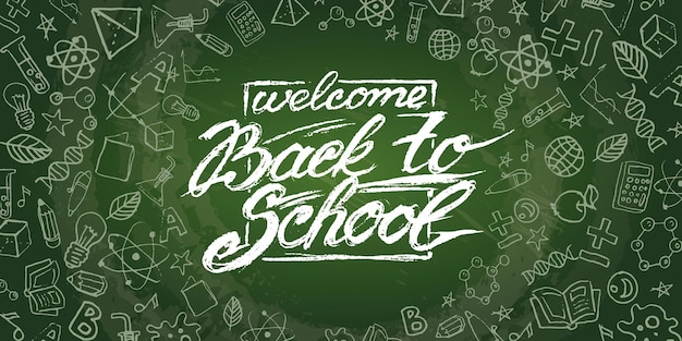 Vector hand drawing lettering welcome back to school.  chalk drew on the chalkboard.