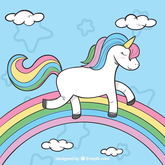 Hand drawn background of unicorn with rainbow