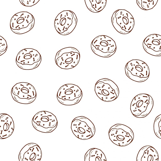 Hand drawn donut seamless pattern.