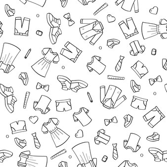 Hand drawn doodle seamless pattern with childish clothes