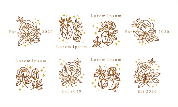 Hand drawn feminine beauty logo with gold flowers, crystals, and stars