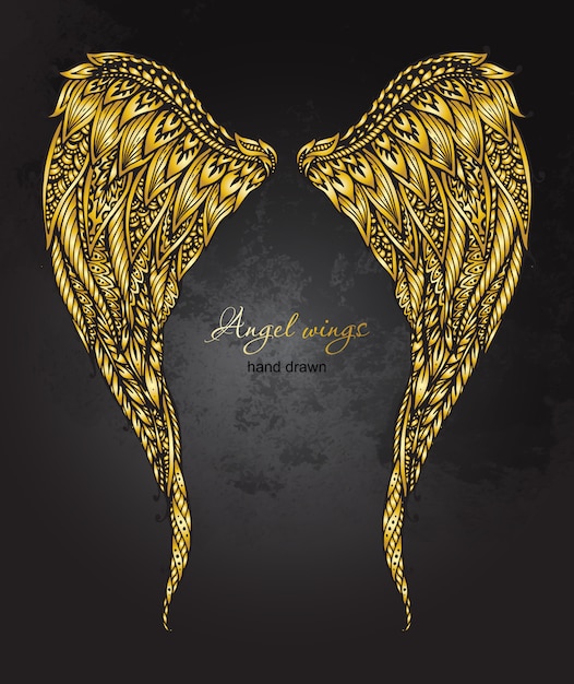 Hand drawn ornate golden angel wings in zentangle style