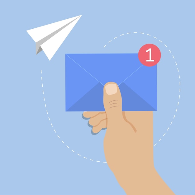 Hand hold blue postal envelope around flying paper plane