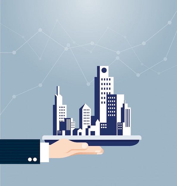 hand holding building real estate concept 