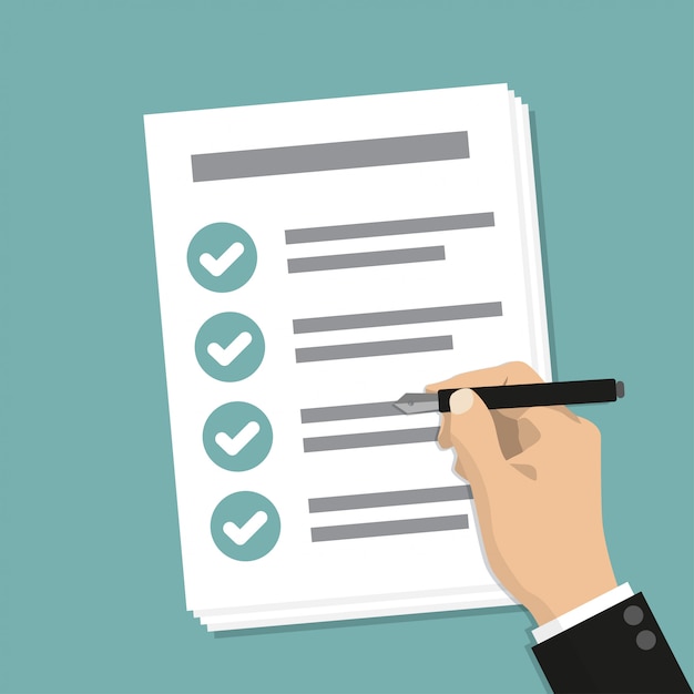 hand holding business paper with checklist and pen