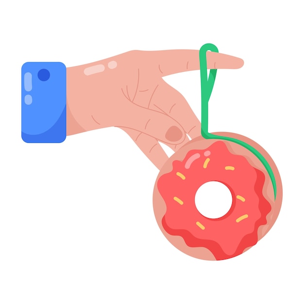 Hand holding a donut with a string that says donut on it.