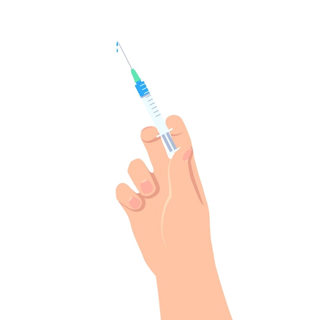 Hand holding medical syringe with medication