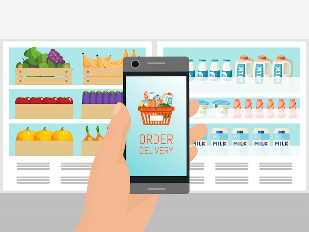 Vector hand holding mobile phone with basket on the screen. supermarket grocery delivery service application. online groceries shopping.