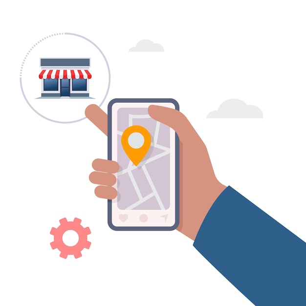 Рука держит мобильный телефон с приложением поиска продуктовый магазин Найти ближайший на карте города