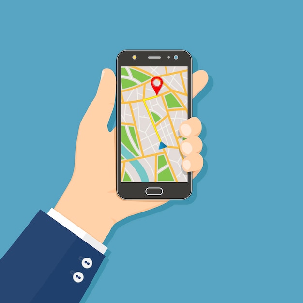 Mano che tiene lo smartphone con il navigatore gps della mappa della città sullo schermo dello smartphone