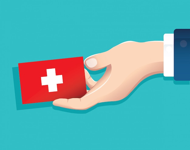 hand holding switzerland flag card