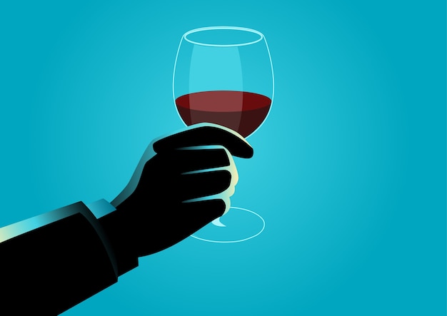 Hand holding a wine glass