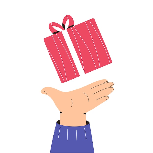 Hand holds a Christmas gift box Holiday greetings Gives gifts