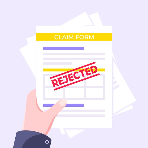 Hand holds rejected claim or credit loan form on it paper sheets and rejected stamp