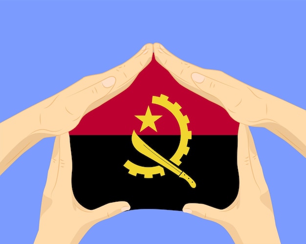 Hand home with angola flag residential or investment idea housing and home concept