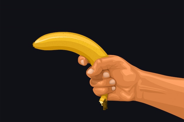 Hand met banaan als een pistool