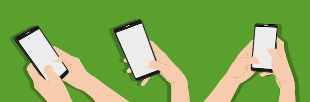 Hand met smartphone op groene achtergrond