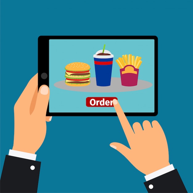 Hand met tablet en bestel fastfood,