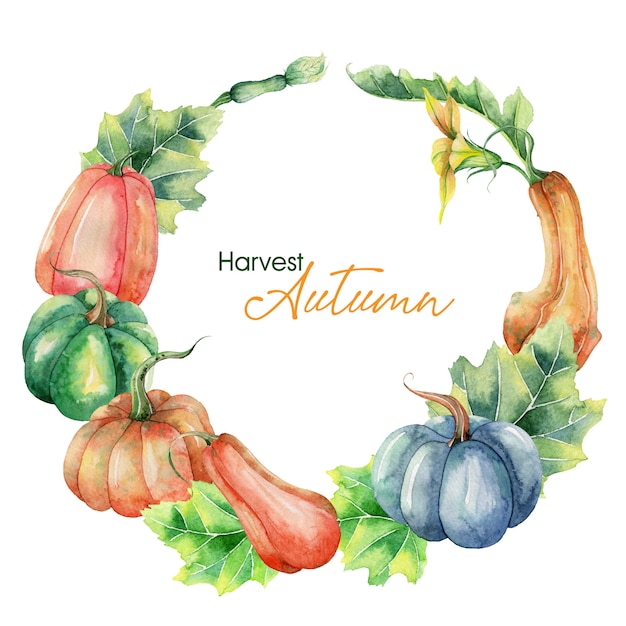 手描きのカボチャと水彩の秋の花輪