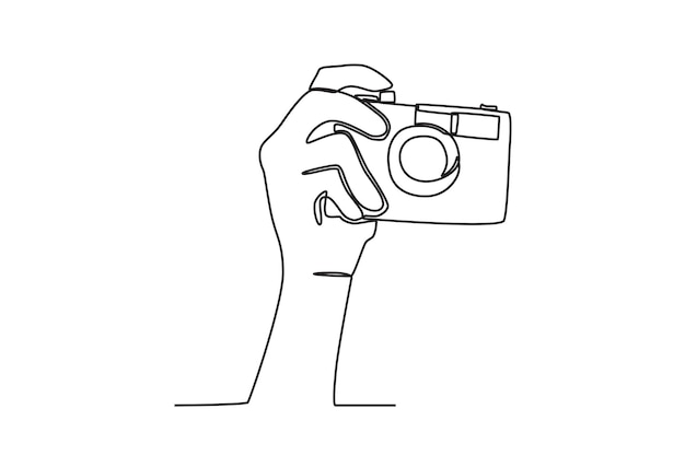 手がカメラのボタンを押す世界写真デーの一行描画