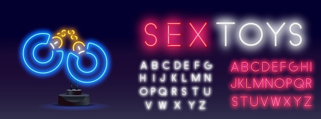 Handcuffs with sex toys lettering neon sign on brick background sex shop electric sign nightclub ero