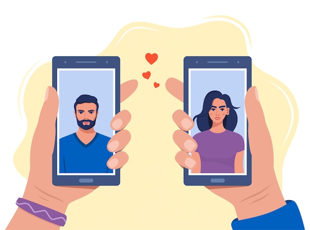 男性と女性のプロファイルを持つスマートフォンを持っている手ロマンスアプリ出会い系サービスアプリケーション
