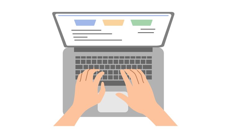 ノートパソコンのキーボードでテキストを入力する手