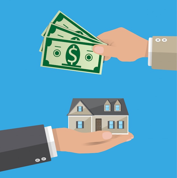 Hands with money and house. real estate