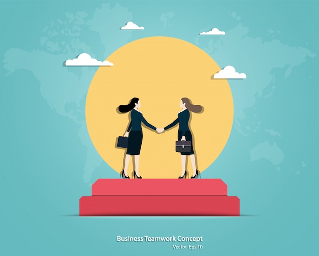 Handshake of business women