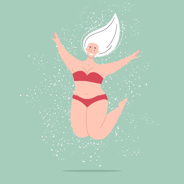 A happy beautiful plump woman in a swimsuit jumping