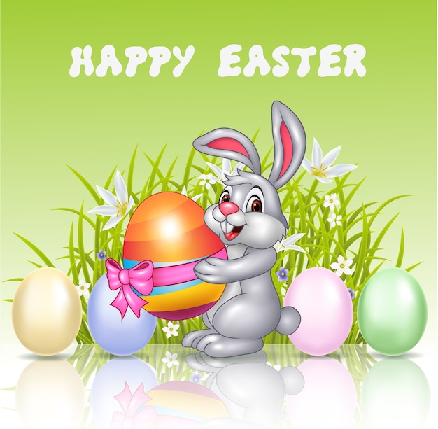 Happy cartoon bunny holding an easter egg