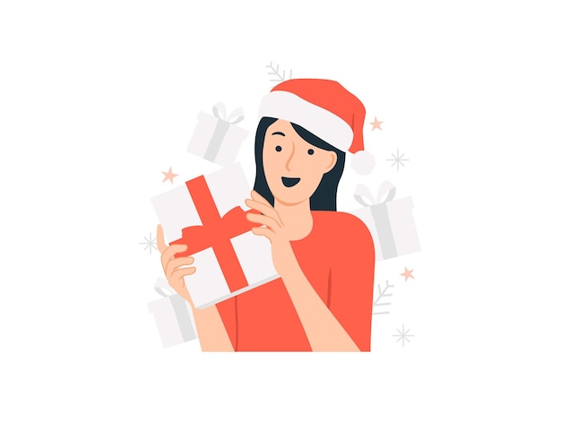 Happy cheerful woman wearing santa hat holding christmas gift present box