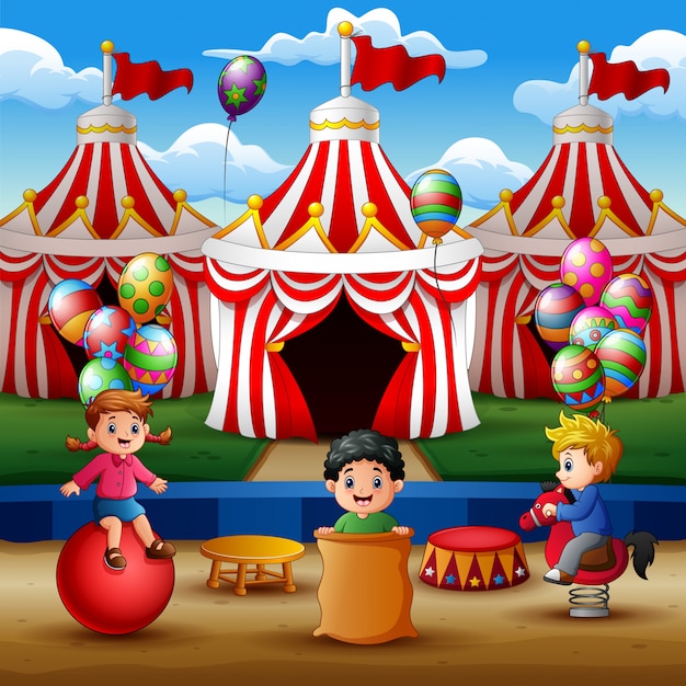 Happy children playing on the circus arena