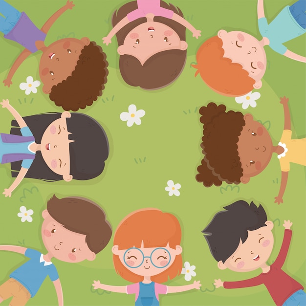 happy childrens day kids lying on a grass field
