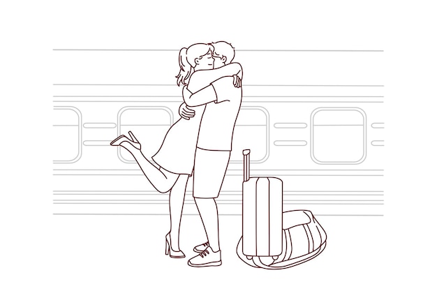 Happy couple hug meeting at railway station