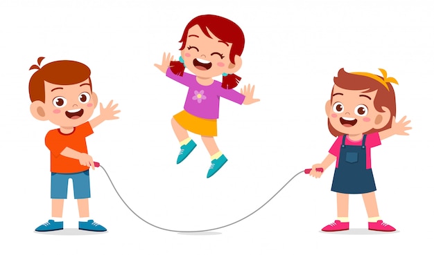 Happy cute kid boy and girl play jump rope