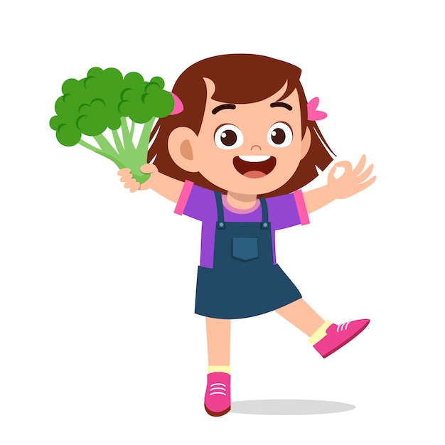 Happy cute kid girl holding fresh vegetable